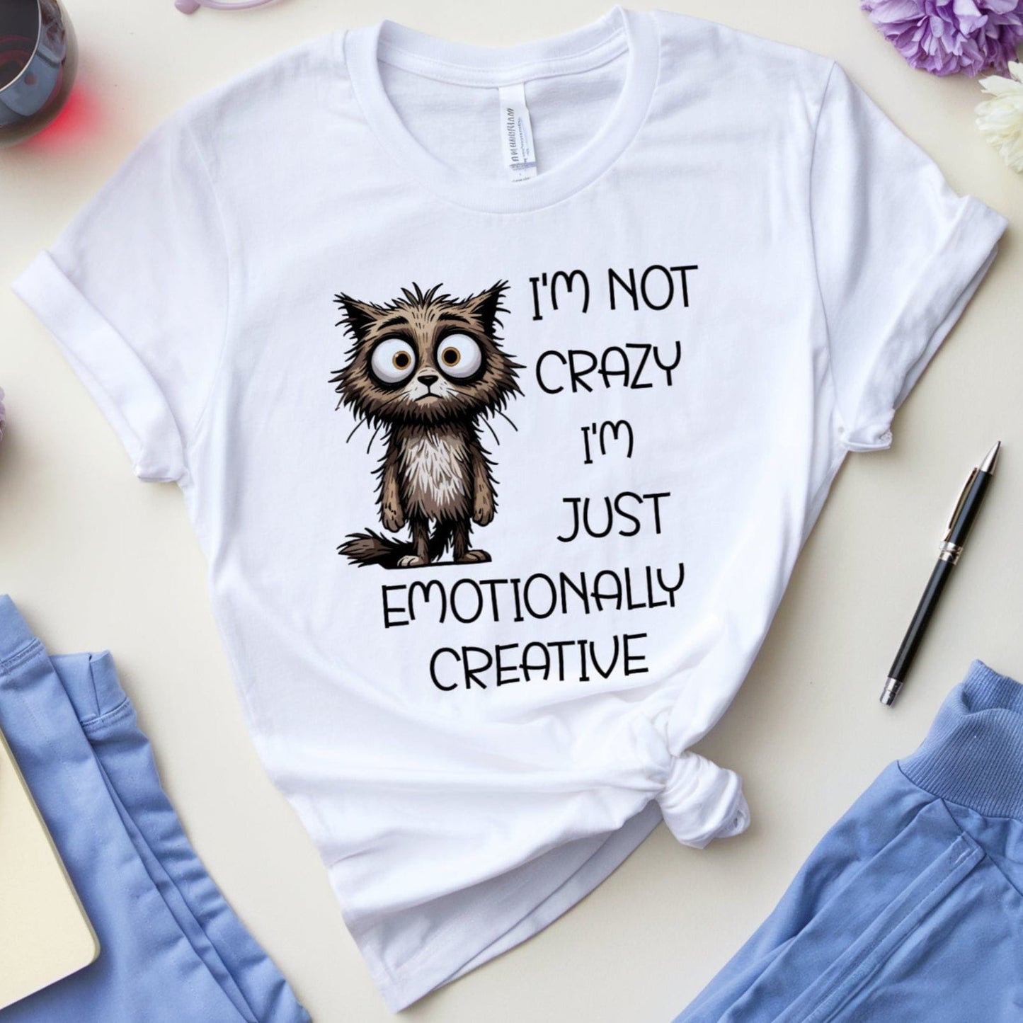 White t-shirt with a cat graphic for mental health that is sarcastic.