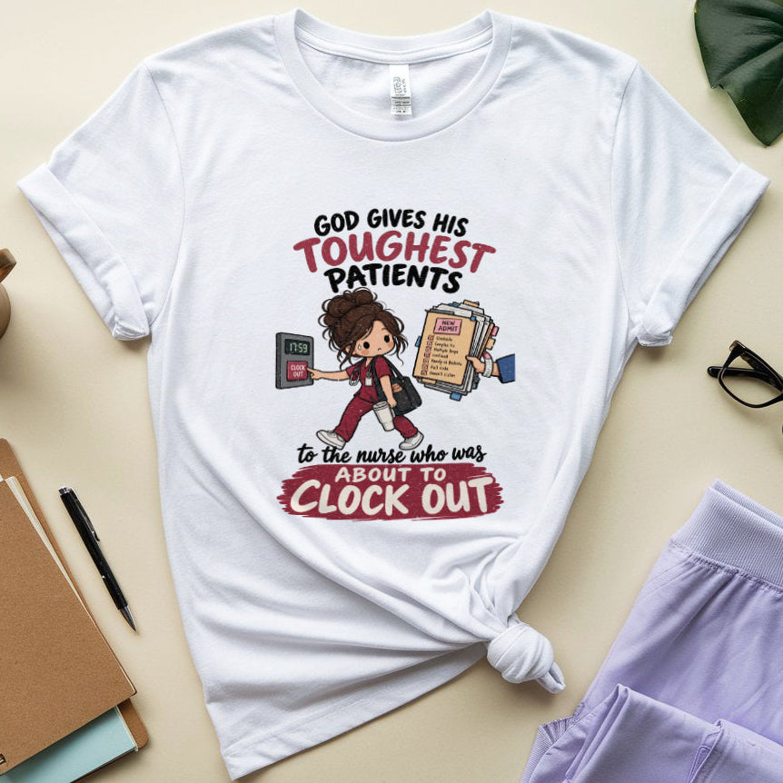 A white graphic t-shirt with a knotted hem, displayed in a flat-lay arrangement with a coffee mug, notebook, glasses, and lavender pajama pants on a beige background. The t-shirt features a cartoon nurse and text that reads 'GOD GIVES HIS TOUGHEST PATIENTS to the nurse who was APRIL 1st to CLOCK OUT'.