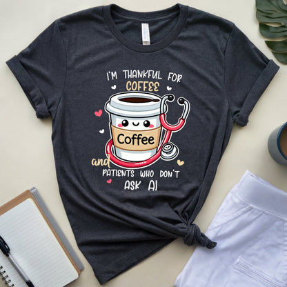 Dark gray t-shirt with coffee-themed design  tshirt with the words 'I'm thankful for coffee and patients who don't ask AI' a funny thanksgiving gift for doctors, nurses or medical students.