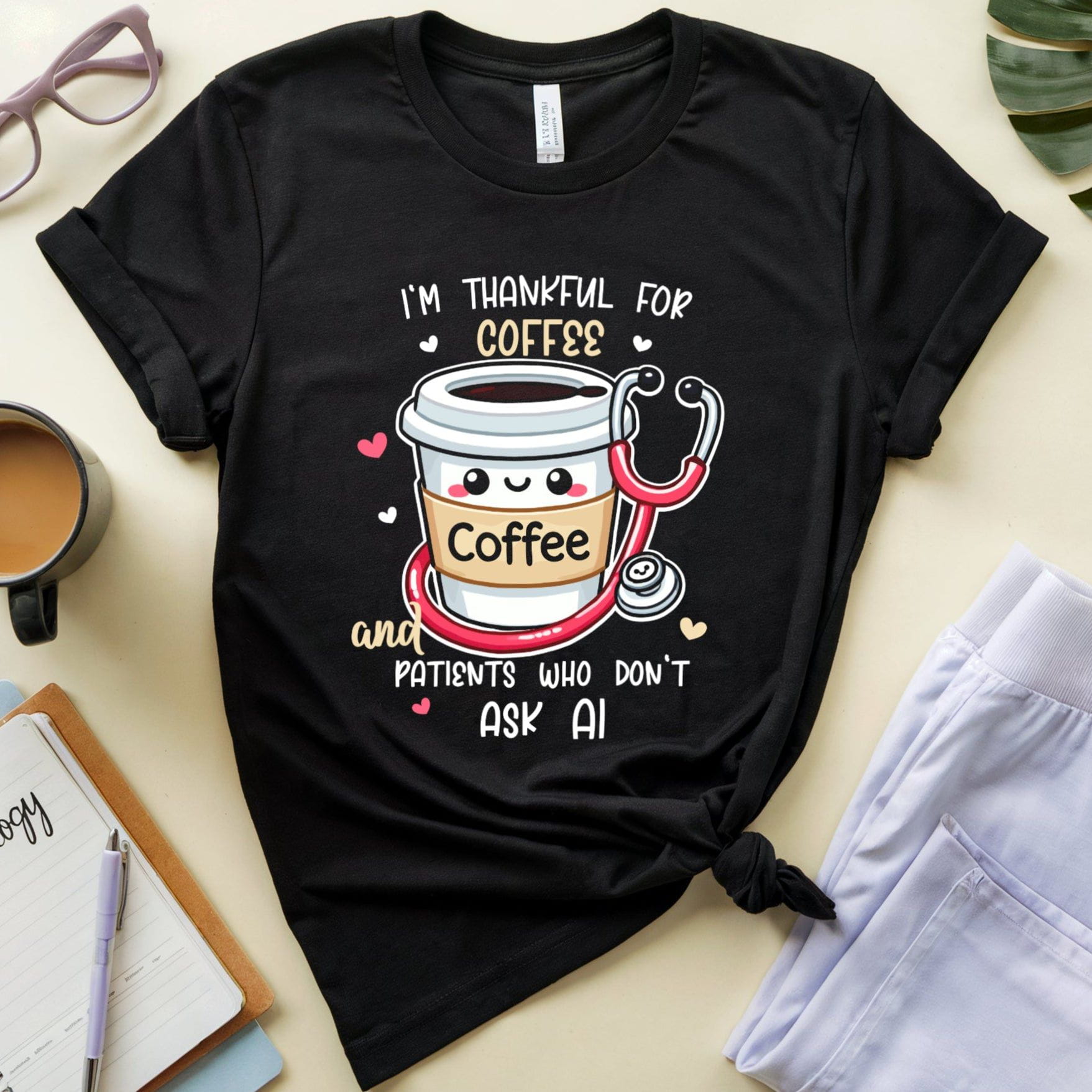 a black tshirt with the words 'I'm thankful for coffee and patients who don't ask AI' a funny thanksgiving gift for doctors, nurses or medical students.