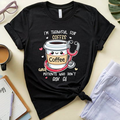 a black tshirt with the words 'I'm thankful for coffee and patients who don't ask AI' a funny thanksgiving gift for doctors, nurses or medical students.