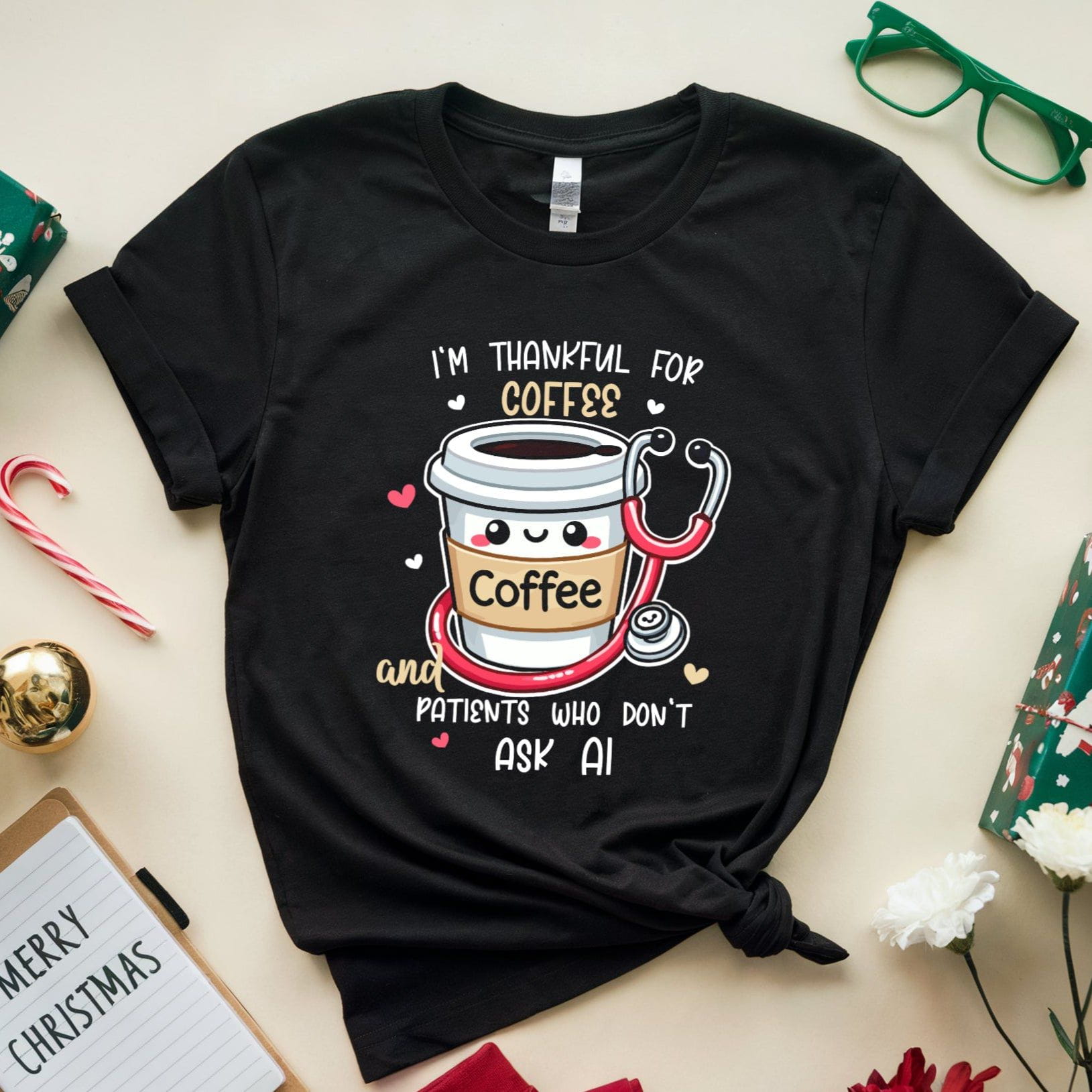 Black t-shirt with coffee-themed design  tshirt with the words 'I'm thankful for coffee and patients who don't ask AI' a funny thanksgiving gift for doctors, nurses or medical students on a festive background with presents and flowers.