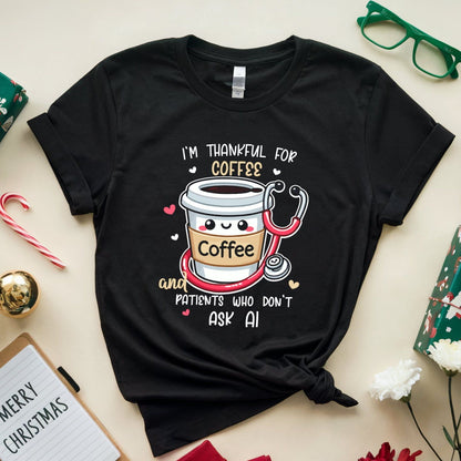 Black t-shirt with coffee-themed design  tshirt with the words 'I'm thankful for coffee and patients who don't ask AI' a funny thanksgiving gift for doctors, nurses or medical students on a festive background with presents and flowers.