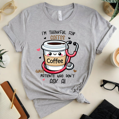 sport gray  tshirt with the words 'I'm thankful for coffee and patients who don't ask AI' a funny thanksgiving gift for doctors, nurses or medical students.