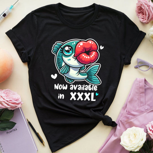 Black t-shirt with a fish graphic and text on a light surface with flowers and sunglasses.