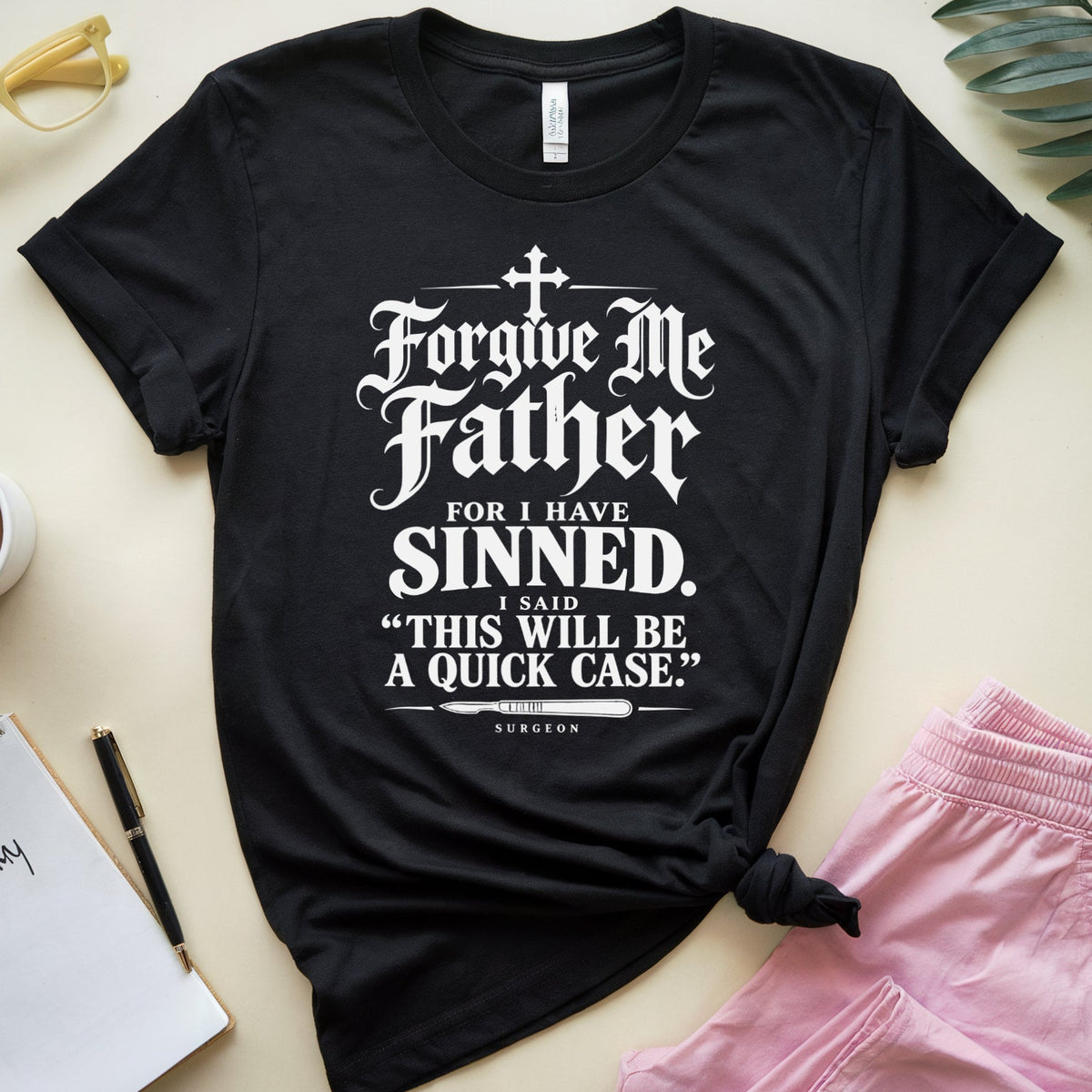 A black graphic t-shirt with white text reading 'Forgive Me Father FOR I HAVE SINNED. I SAID "THIS WILL BE A QUICK CASE.