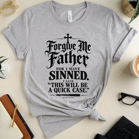 A heather gray graphic t-shirt with a black gothic-style text print reading 'Forgive Me Father FOR I HAVE SINNED. I SAID "THIS WILL BE A QUICK CASE.