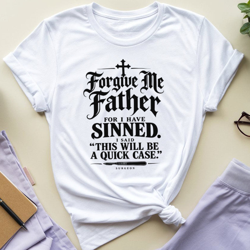 A white short-sleeve graphic T-shirt laid flat on a light beige surface, styled with a knot at the hem. The shirt features a black gothic-style text print reading, 'Forgive Me Father FOR I HAVE SINNED.